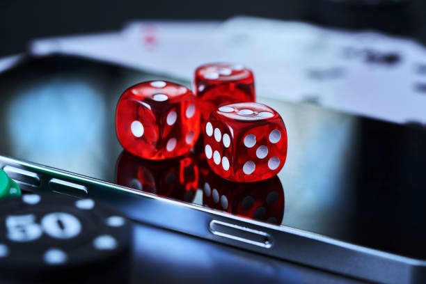Antarmuka aplikasi mobile rajaapk menampilkan meja dealer langsung dan pasar sepak bola
